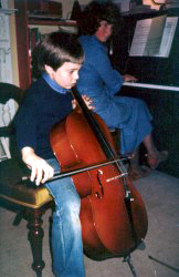 Richard aged 10 playing cello accompanied by his mother on piano Richard aged 10 playing cello accompanied by his mother on piano